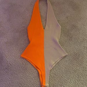 NWOT Color block body suit